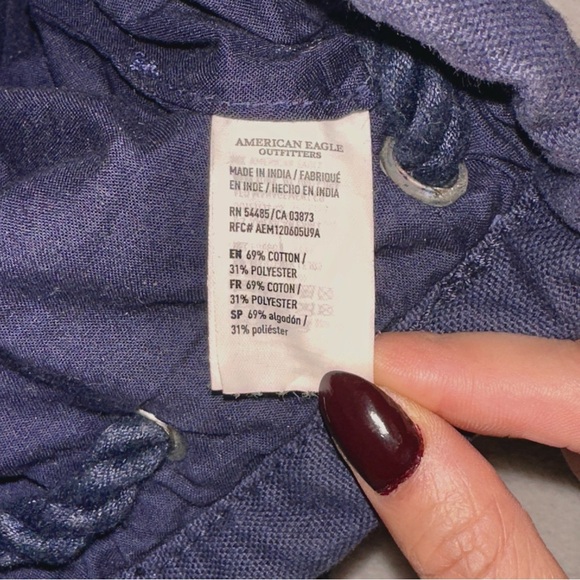 Blue Drawstring Backpack with Striped and Geometric Design - Picture 4 of 4